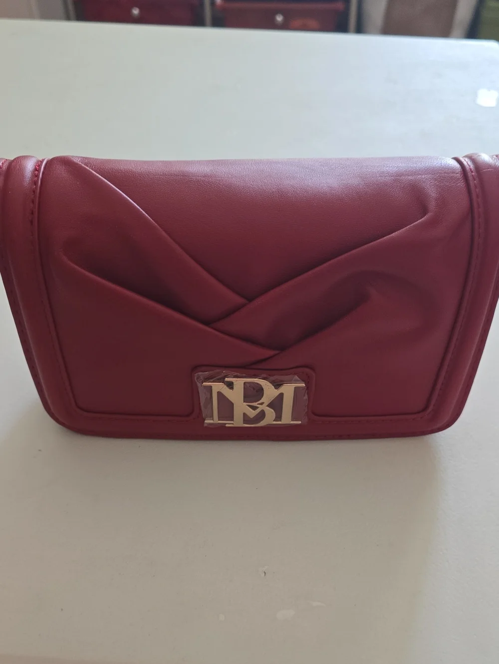 Badgley Mischka Red Brick Quilted Wristlet Clutch with Gold Logo